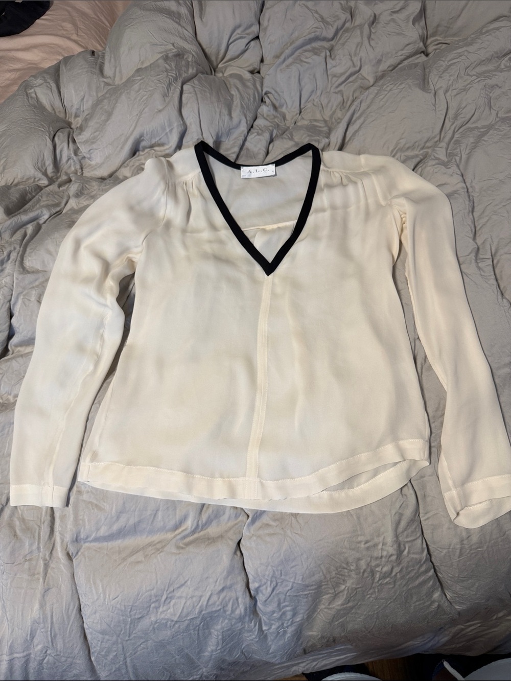 A.L.C. Ivory V-Neck Silk Blouse with Black Trim